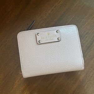 kate spade pale pink zip-around wallet